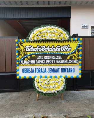 Papan Bunga Duka di Menou